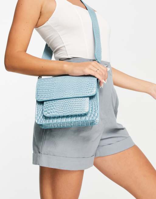 Hvisk Vegan Cayman cross body bag with front pocket in blue croc