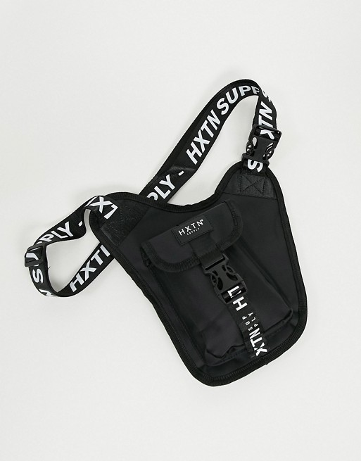 HXTN supply asymmetric bodybag in black with logo print