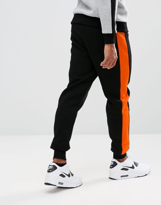 Jogging noir et orange new arrivals