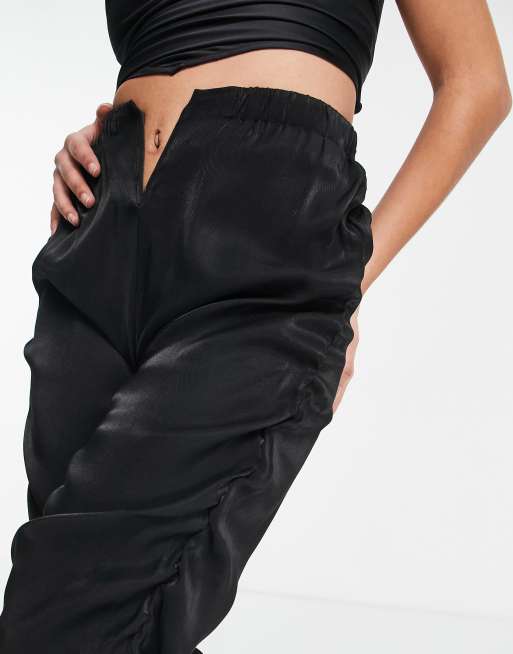 Pantalon noir best sale ouvert devant