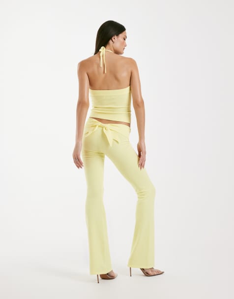 I.AM.GIA Audrina 2.0 sculpting knit ribbed waist bow back flare trouser co-ord in yellow - view 1