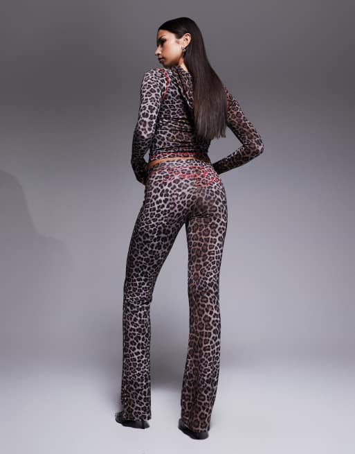 I.AM.GIA Blare logo back print contrast stitch track pant co-ord in dark leopard print, 4 of 5