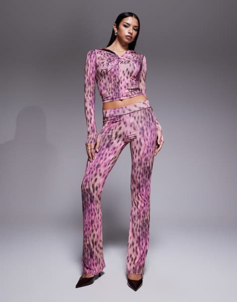 I.AM.GIA Blare logo back print contrast stitch track pant co-ord in pink animal print - view 1