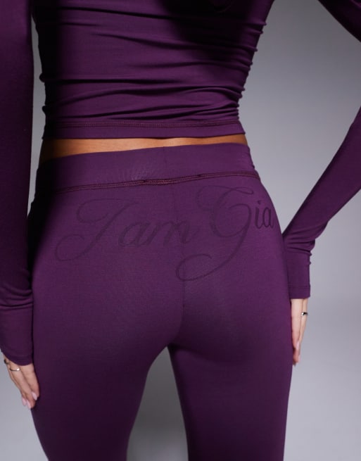 I.AM.GIA Blare logo back print contrast stitch track pant co-ord in plum, 3 of 5