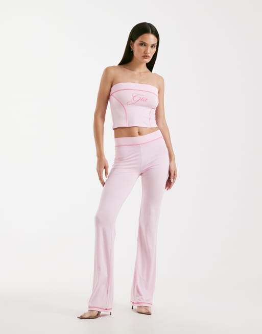 I.AM.GIA Blare logo contrast stitch track pants, tube top, and zip through hoodie set in baby pink