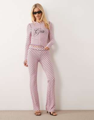 I.AM.GIA Blare logo contrast stitch zip through hoodie and track pant co-ord in pink and black polka dot | ASOS