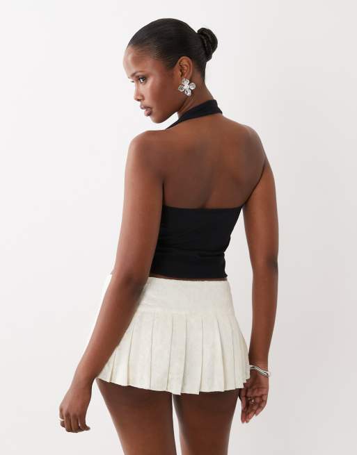 I.AM.GIA Remini lace button detail drop waist pleated mini skirt in white, 5 of 5
