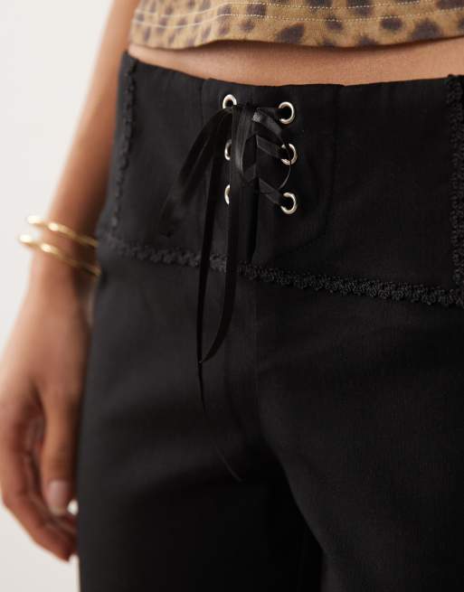 I.AM.GIA Seraya stretch woven mid rise wide leg lace up detail trousers in black, 2 of 5