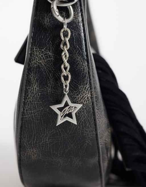 I.AM.GIA Tia textured faux leather chrome logo detail fringe front