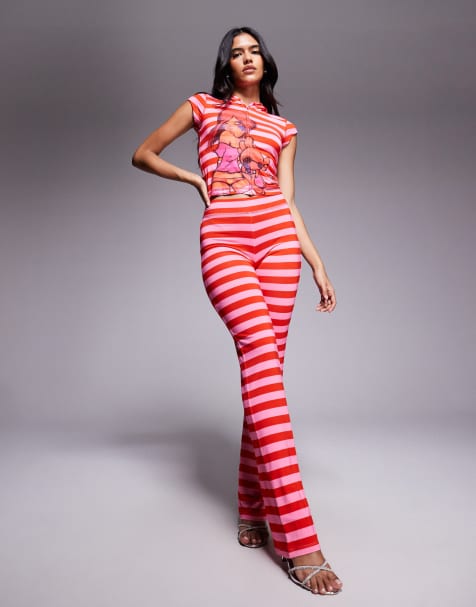 I.AM.GIA x Fafi Blare - Fafinettes - Flare trainingsbroek van co-ord set met strepen en logo in siersteentjes in roze en rood - view 1