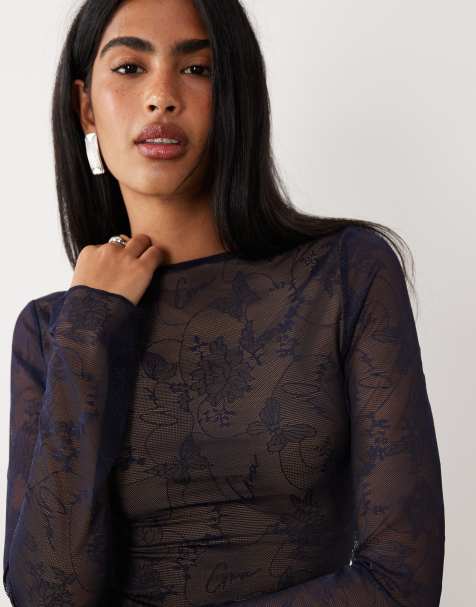 I.AM.GIA Yvette v neck butterfly pattern lace logo flare sleeve top co-ord in navy - view 1