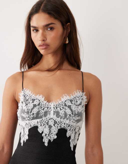 I.AM.GIA Zarina sculpting satin look lace contrast asymmetric hem mini dress  in mono | ASOS