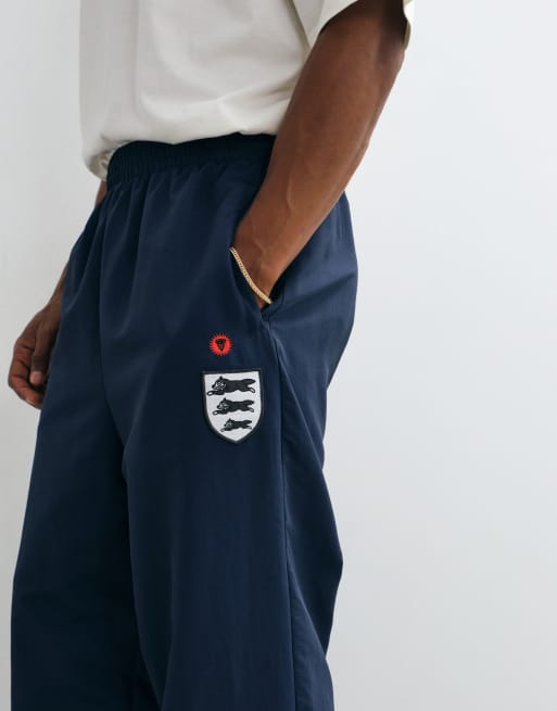 ICECREAM - Joggingbroek met rennende hond-patch in marineblauw, 4 van 5