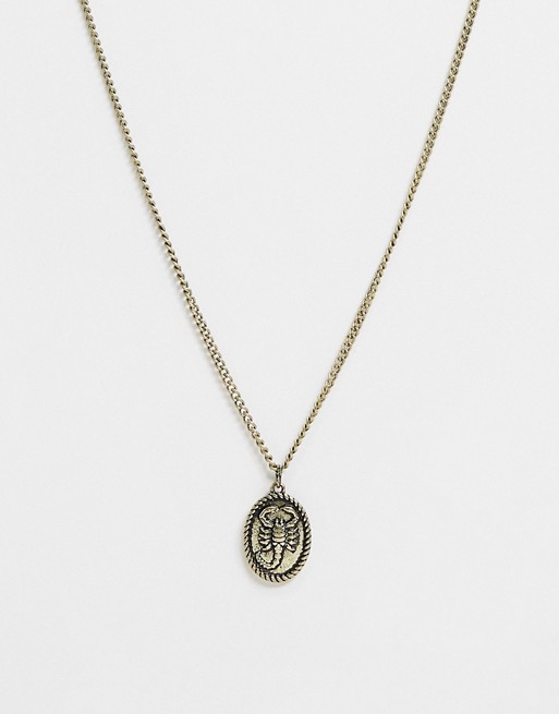 Icon Brand neckchain in gold with oval scorpion pendant