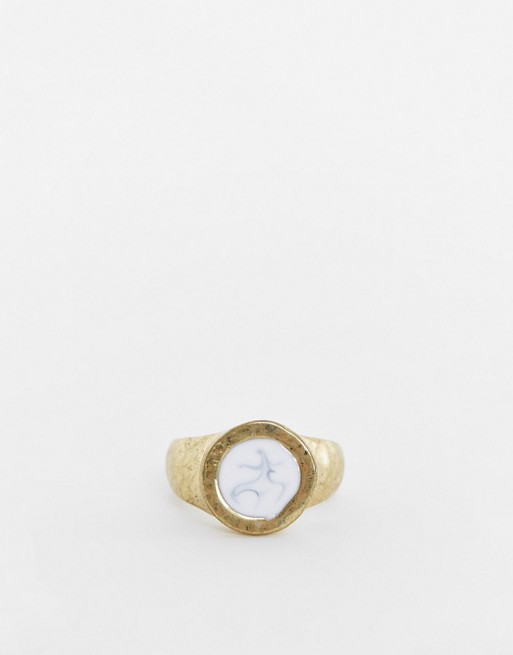 Icon Brand signet ring in gold with white stone