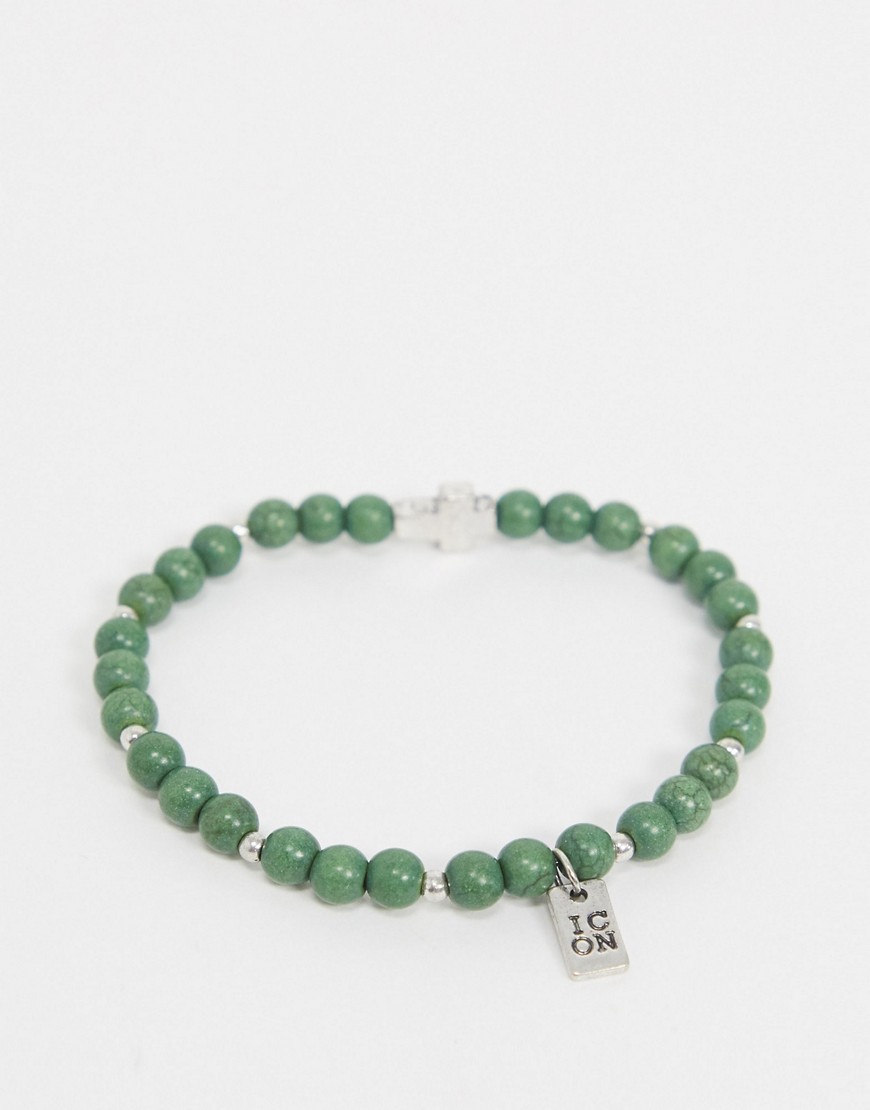 Icon – Grönt armband med pärlor och korshänge