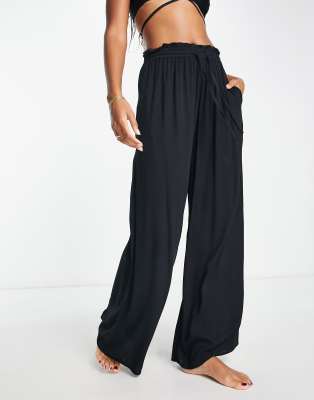 Exclusive beach drawstring pants in black