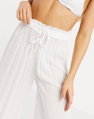Iisla \u0026 Bird Exclusive Beach Drawstring Pants in White