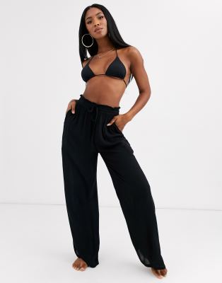 Iisla \u0026 Bird Exclusive Drawstring Beach Pants in Black