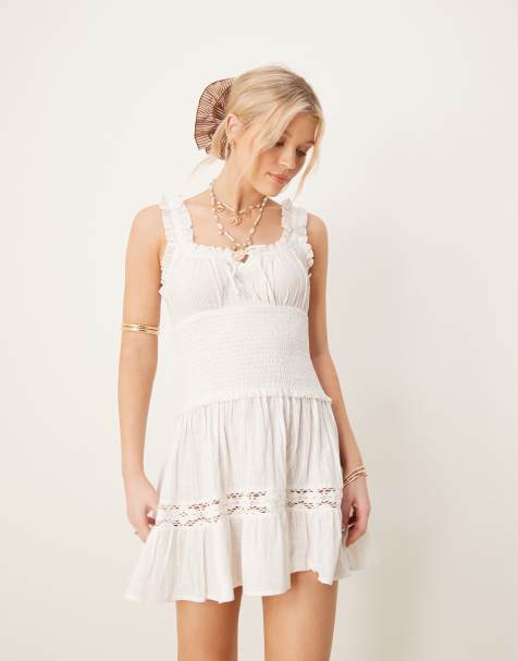 Iisla & Bird – Gesmoktes Strand-Minikleid in Weiß - view 1