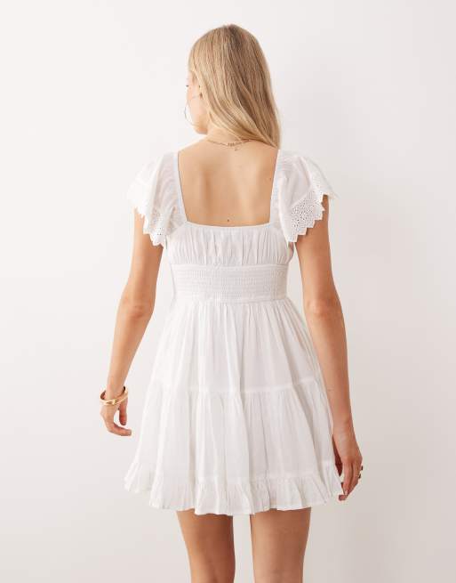Iisla & Bird – Gräddvit strandklänning i minilängd av broderie anglaise, 4 av 4