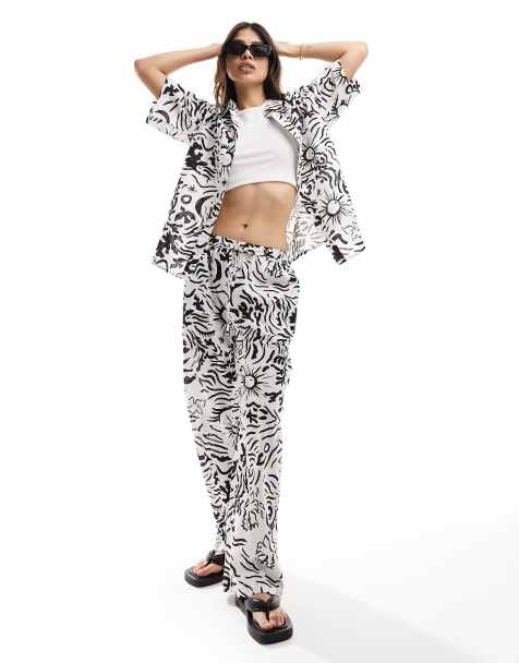 IIsla & bird graphic print loose fit beach trouser co-ord in white and black