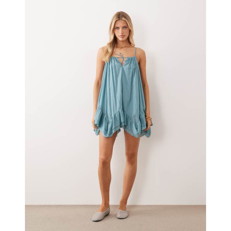 Iisla & Bird handkerchief hem mini dress in dusky blue | ASOS