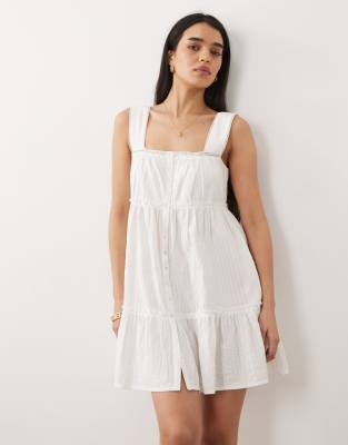 Iisla & Bird - Mini-Strandkleid in Weiß mit Knopfleiste