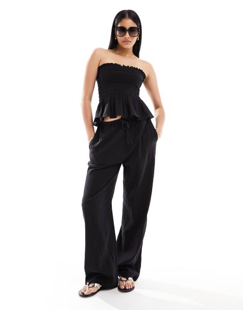 Iisla & Bird narrow waist beach pants in black (part of a set) - view 1