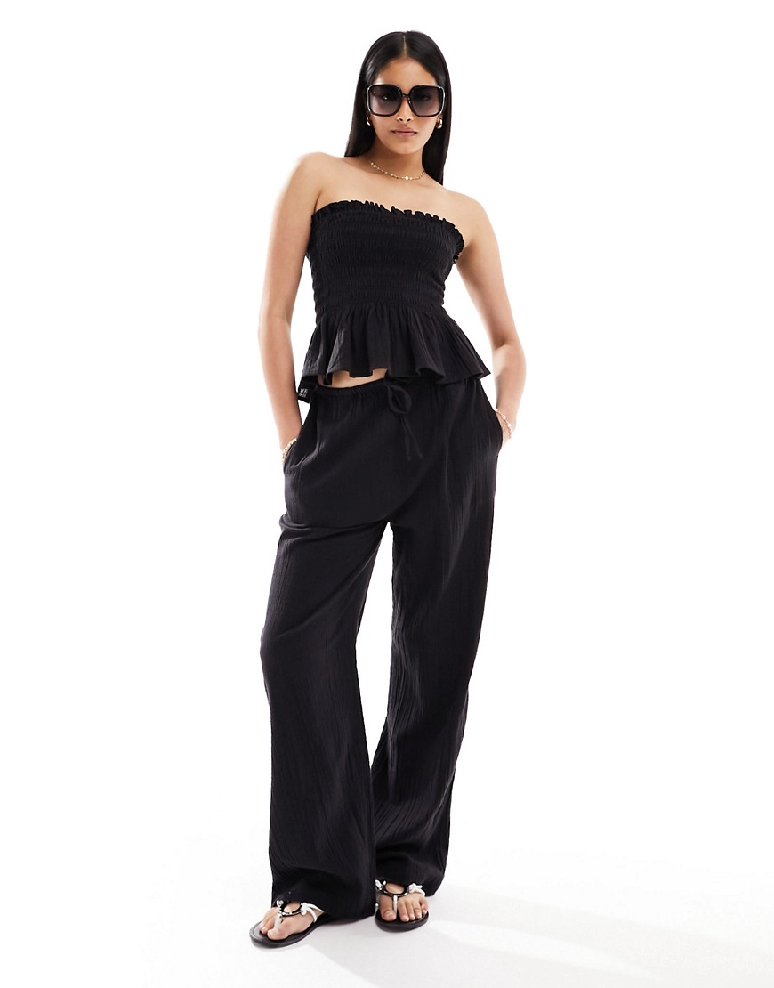 IIsla & Bird narrow waist beach trouser co-ord in black