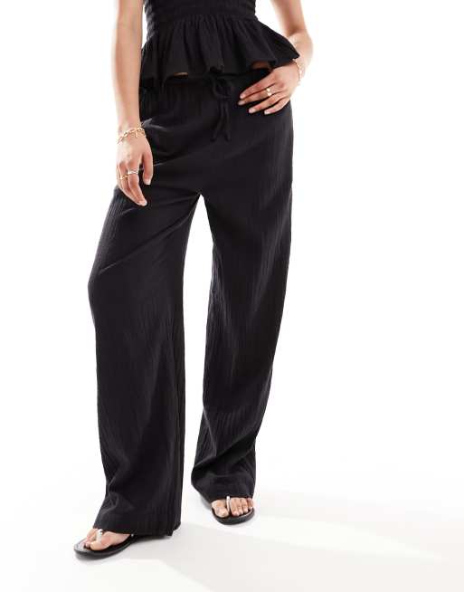 IIsla & Bird narrow waist beach trouser co-ord in black, 2 of 5