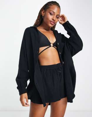 Iisla & Bird - Strand-Shorts mit Oversize-Schnitt in Schwarz