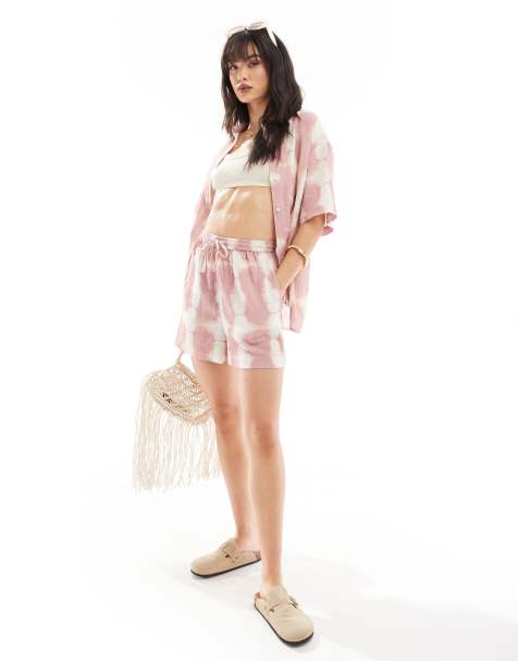 Iisla & Bird tie dye beach shorts in pink - part of a set - view 1