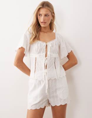 Iisla & Bird Iisla & Bird tie front beach top with lace detail in white