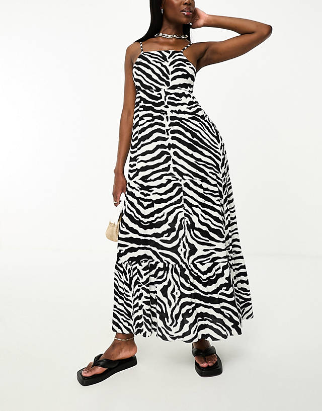 Iisla & Bird - tiered maxi beach dress in black and white zebra print