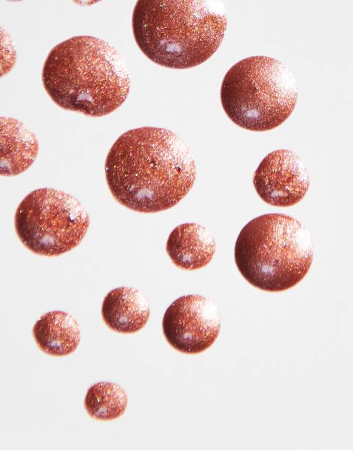 Iluminador Rollaway Glow de Iconic London: Tono Peach Paradise, 3 de 4