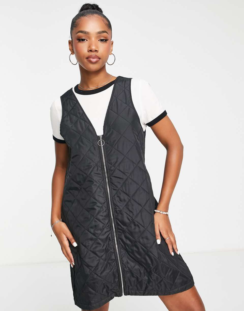 Black quilted mini pinafore dress