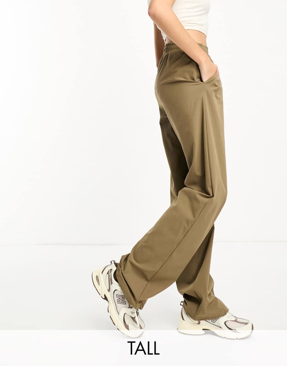 Beige elastic waist trousers