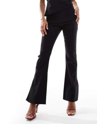 bengaline side split flared leg pants in black - part of a set