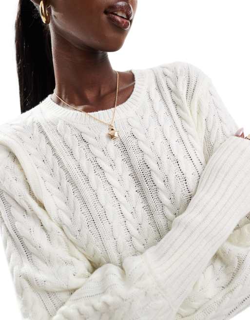 In The Style cable knit mini skater jumper dress in cream ASOS