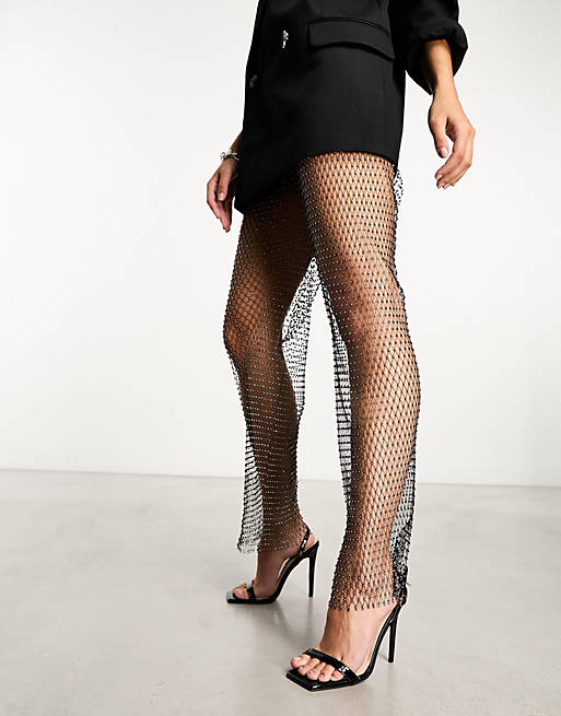 In The Style exclusive all over diamante mesh leggings in black