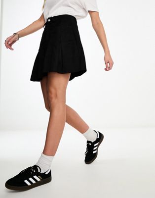 In The Style exclusive box pleat denim mini skirt in black