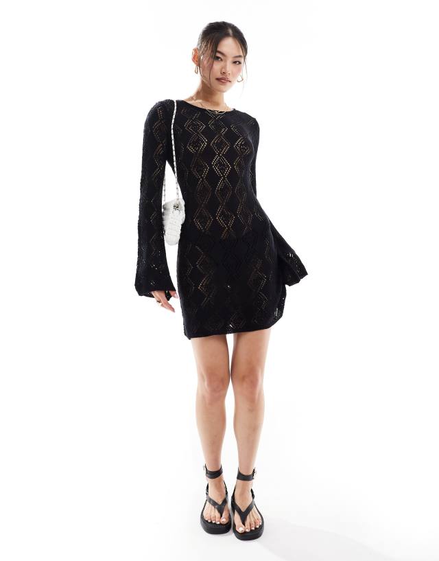 In The Style - exclusive crochet bell sleeve mini beach dress in black