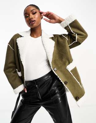 In The Style exclusive faux suede contrast borg seam detail jacket in khaki-Green