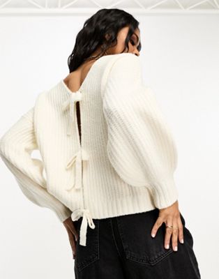 In The Style exclusive knitted bow back balloon sleeve jumper in cream