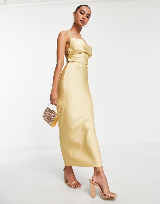 In The Style exclusive satin cowl front midi dress in gold