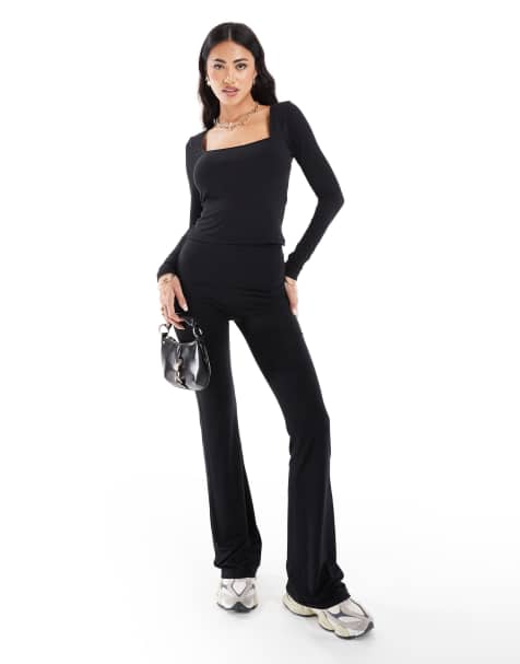 In The Style fITS mix and match slinky sculpt foldover waist flare trousers co-ord in black - view 1