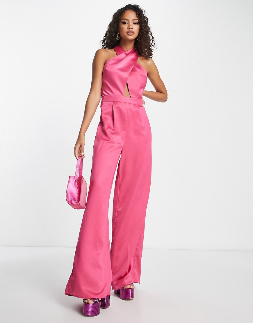 In The Style halterneck cut out waist wide leg jumpsuit in pink