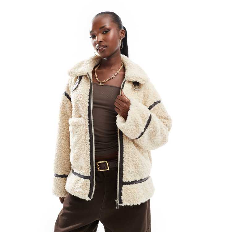 In The Style oversized pocket faux shearling borg coat in cream ASOS