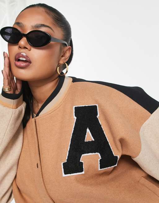 Varsity Bomber Jackets are big and this is how to wear them - plus the best  from the high street